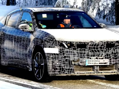 全新寶馬iX4路試諜照來襲，溜背轎跑設計，續航超800km下半年登場